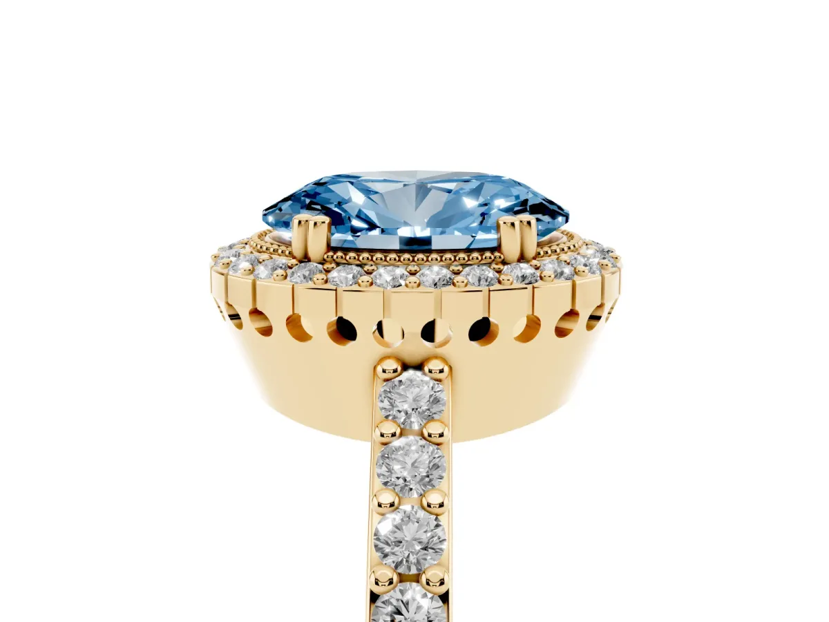 Fancy Blue Oval Cut Cut Diamond Halo Engagement Ring with Milgrain Detail and Pavé Band Yellow gold