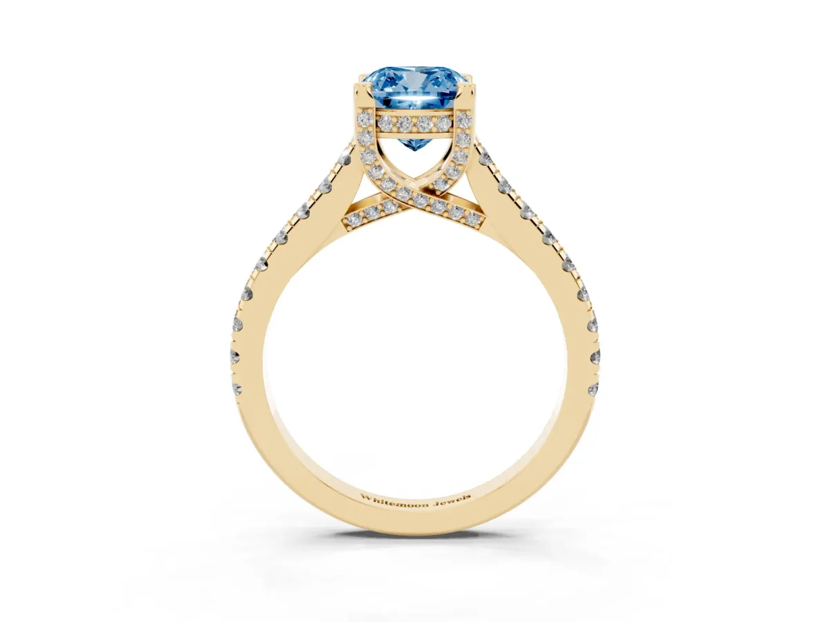 Fancy Blue Cushion Cut Brilliant Diamond Solitaire with Pavé Band and Four-Prong Setting Yellow gold