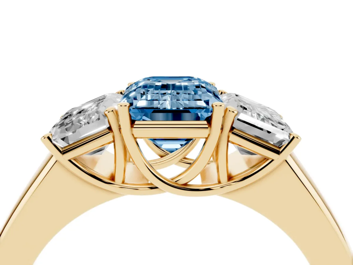 Fancy Blue Three-Stone Emerald Cut Cut Diamond Ring with Prong Setting and Classic Band Yellow gold