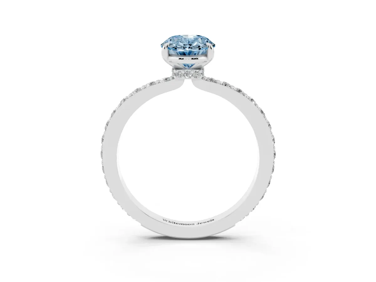 Fancy Blue Oval Cut Diamond Pavé Engagement Ring with Round Accents and Prong Setting Platinum