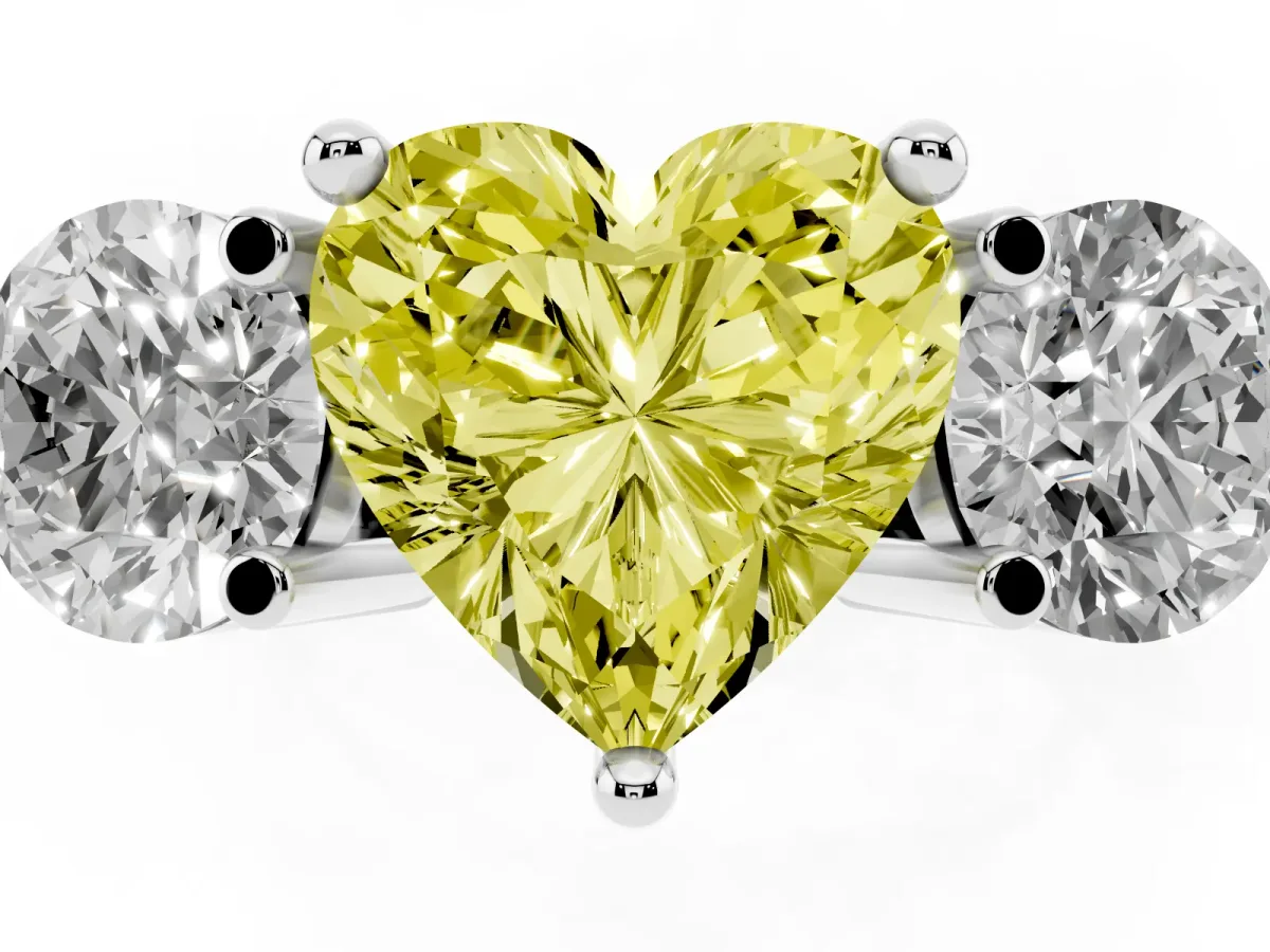 Fancy Yellow Three-Stone Heart Cut Brilliant Cut Solitaire Ring with Prong Setting on a Classic Band Silver
