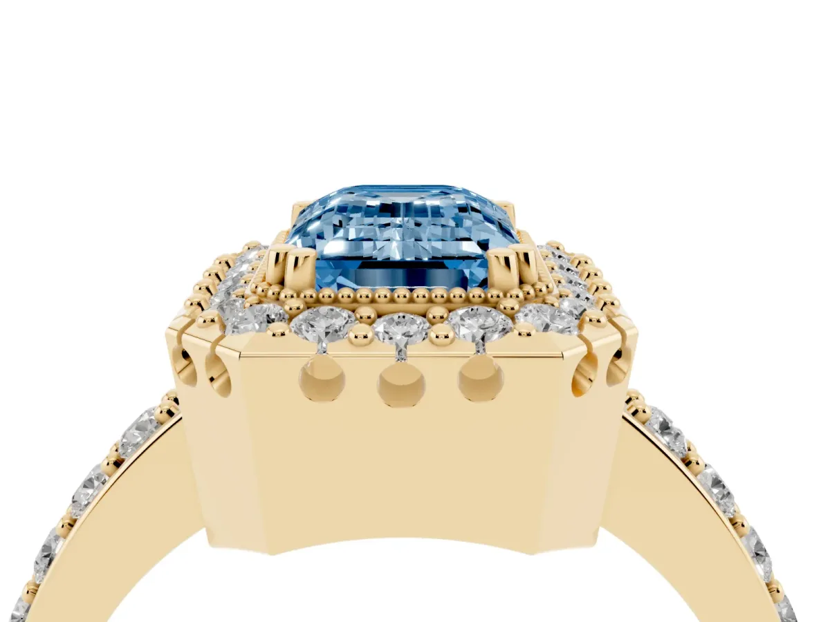 Fancy Blue Emerald Cut Diamond Halo Ring with Pavé Band and Prong Setting Yellow gold