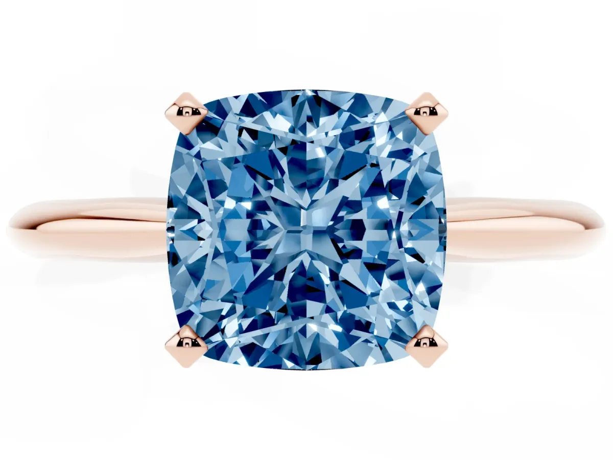 Fancy Blue Cushion Cut Cut Solitaire Ring with Four-Prong Setting on a Classic Band Rose gold