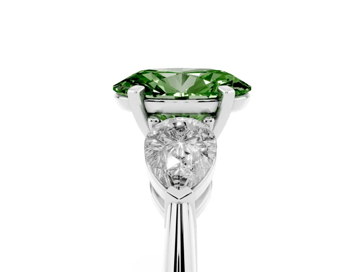 Fancy Green Three-Stone Oval Cut Diamond Ring with Pear Side Stones and Four-Prong Setting Silver