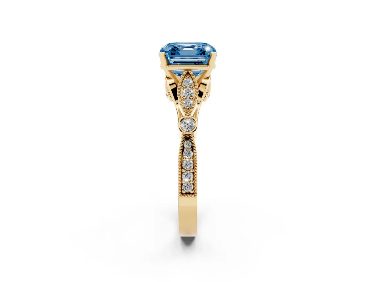Fancy Blue Asscher Cut Cut Diamond with Milgrain Marquise and Bezel Accents on a Solitaire Band with Prong Setting Yellow gold