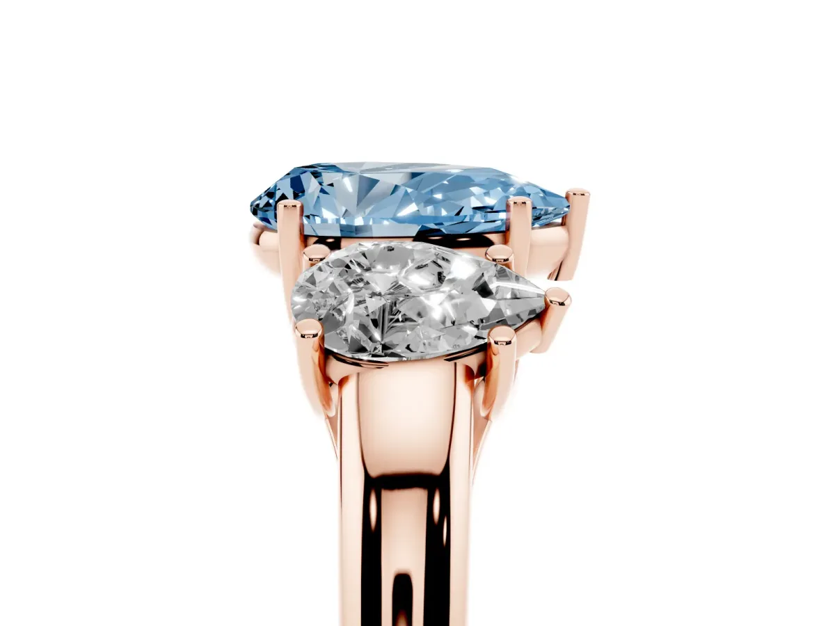 Fancy Blue Three-Stone Pear Cut Diamond Engagement Ring with Prong Setting Rose gold