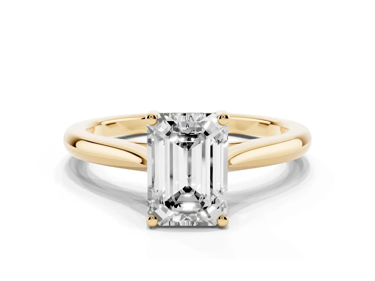Emerald Cut Cut Solitaire Ring with Cathedral Band and Four-Prong Setting Yellow gold