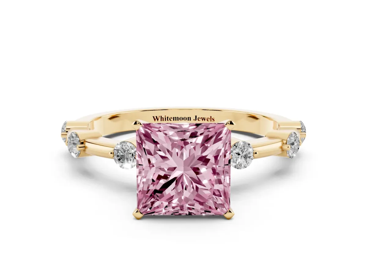 Fancy Pink Princess Cut Solitaire Diamond Ring with Bezel Set Side Stones and Prong Setting Yellow gold