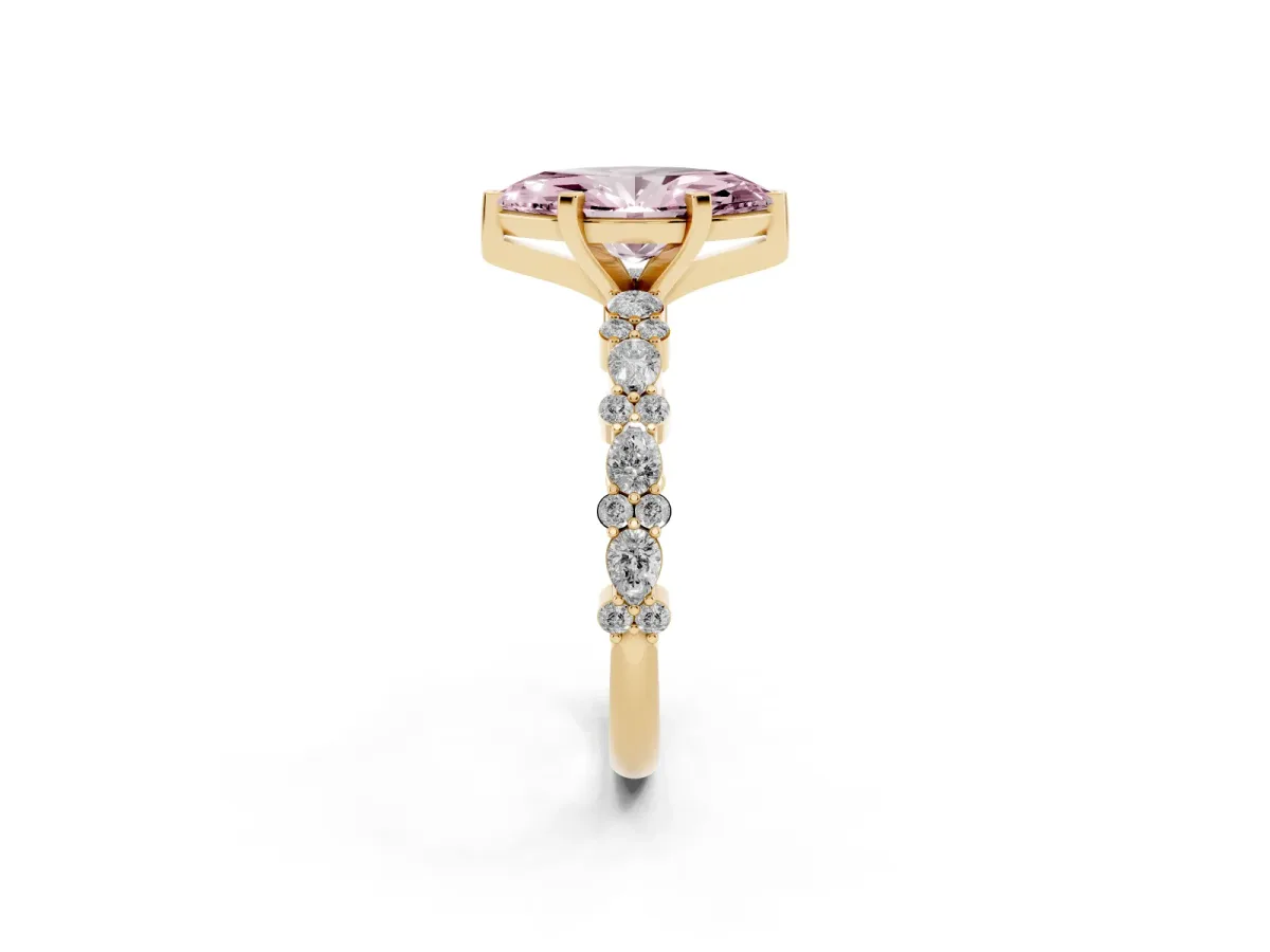 Fancy Pink Marquise Cut Diamond Side Stone Solitaire Ring with Round and Four-Prong Setting Yellow gold