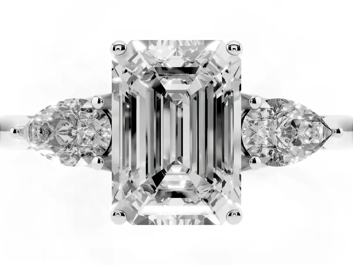 Three-Stone Emerald Cut Brilliant Diamond Solitaire Ring with Tapered Band and Four-Prong Setting Platinum
