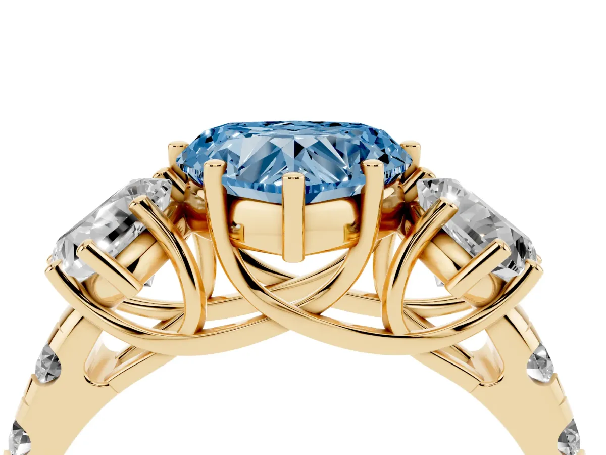 Fancy Blue Three-Stone Heart Cut Diamond Pavé Band with Prong Setting Yellow gold