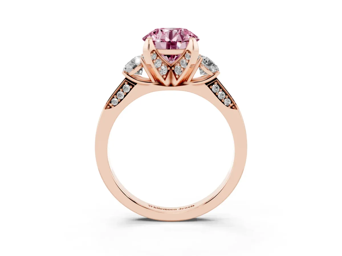 Fancy Pink Round Cut Brilliant Three-Stone Diamond Ring with Pavé Band and Four-Prong Setting Rose gold