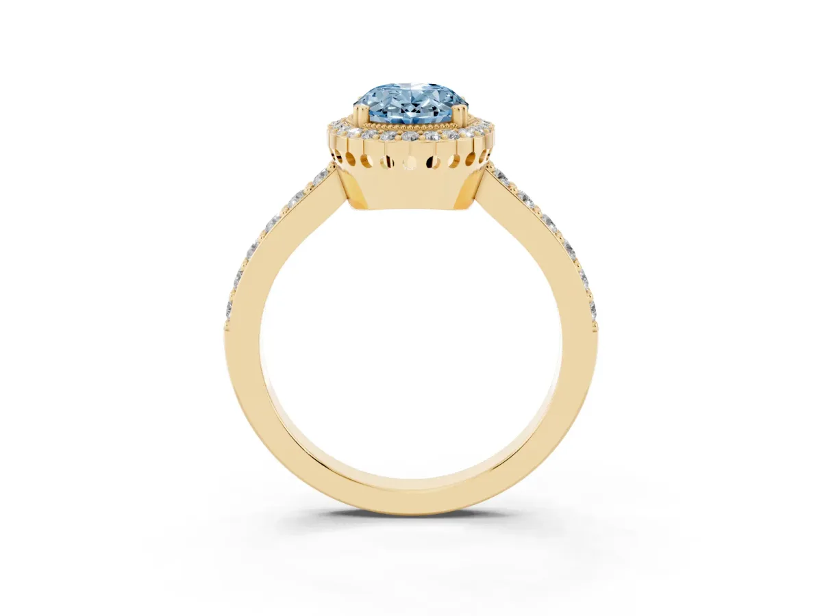 Fancy Blue Oval Cut Cut Diamond Halo Engagement Ring with Milgrain Detail and Pavé Band Yellow gold