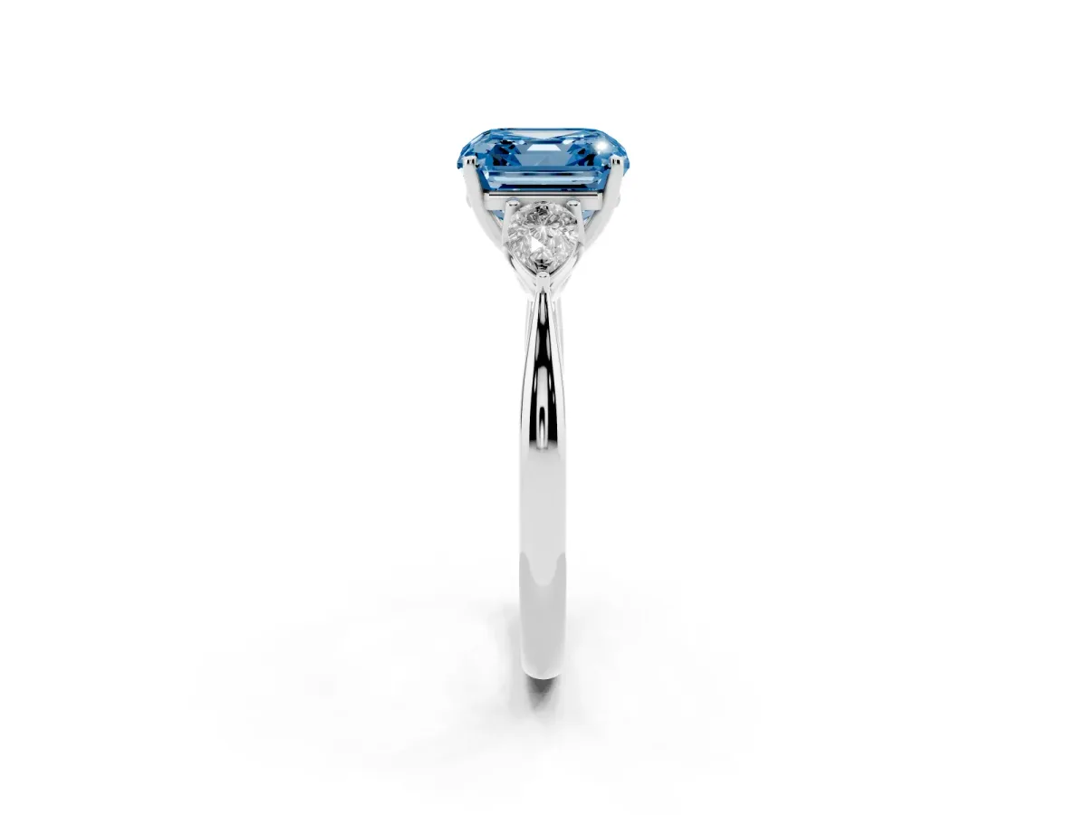 Fancy Blue Three-Stone Asscher Cut Diamond Ring with Pear Side Stones in Four-Prong Setting Silver