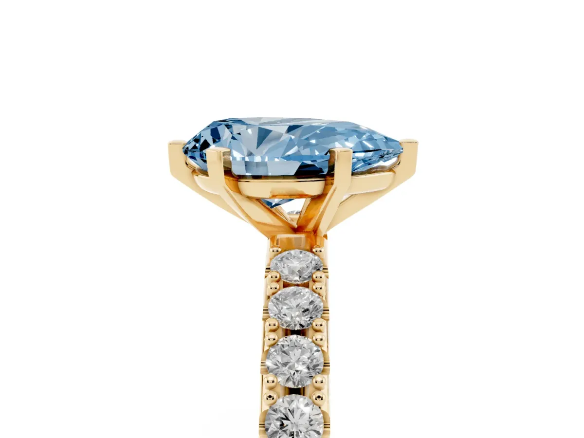 Fancy Blue Pear Cut Diamond Solitaire Pavé Band with Four-Prong Setting Yellow gold