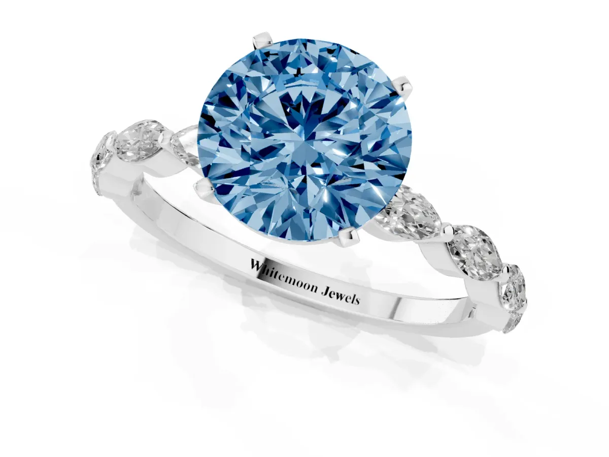 Fancy Blue Round Cut Diamond Ring with Marquise Side Stones and Prong Setting Platinum