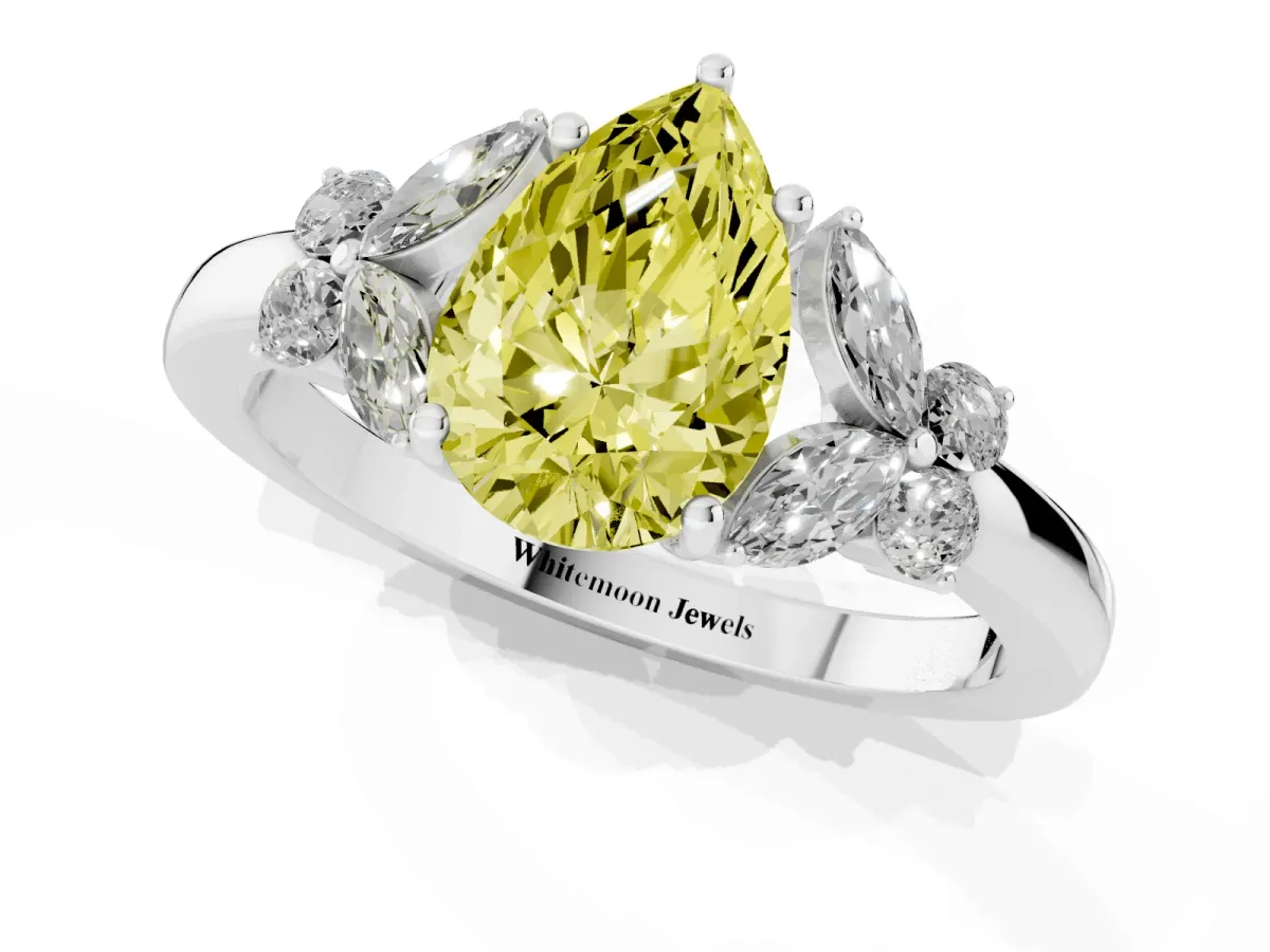 Fancy Yellow Pear Cut Cut Solitaire Floral Diamond Ring with Four-Prong Setting Platinum