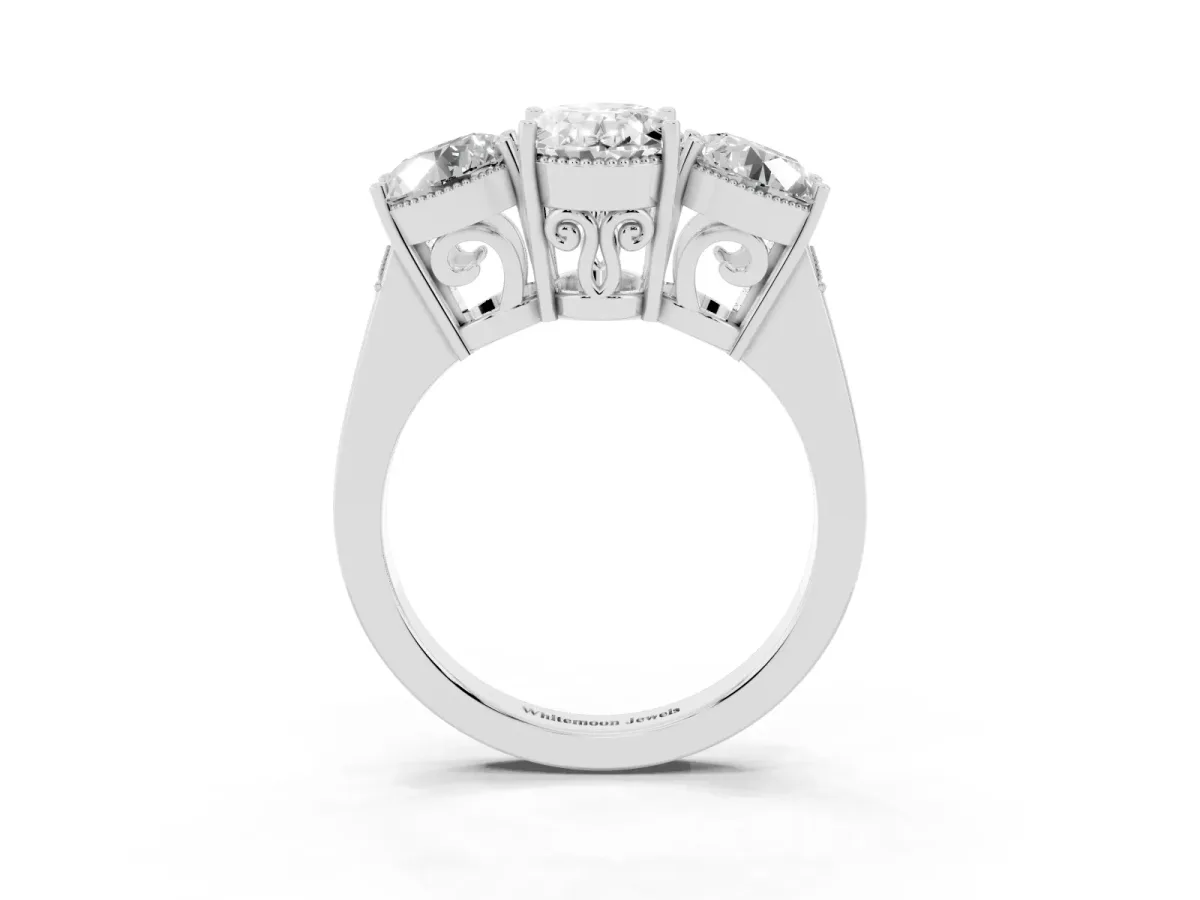 Three-Stone Oval Cut Diamond Engagement Ring with Prong Setting on a Classic Band Silver