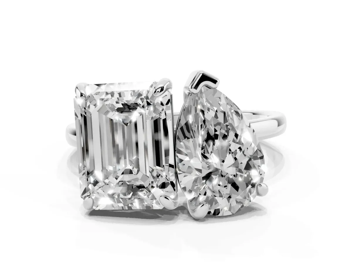 Pear and Emerald Toi Moi Ring with Prong Setting and Plain Band Silver