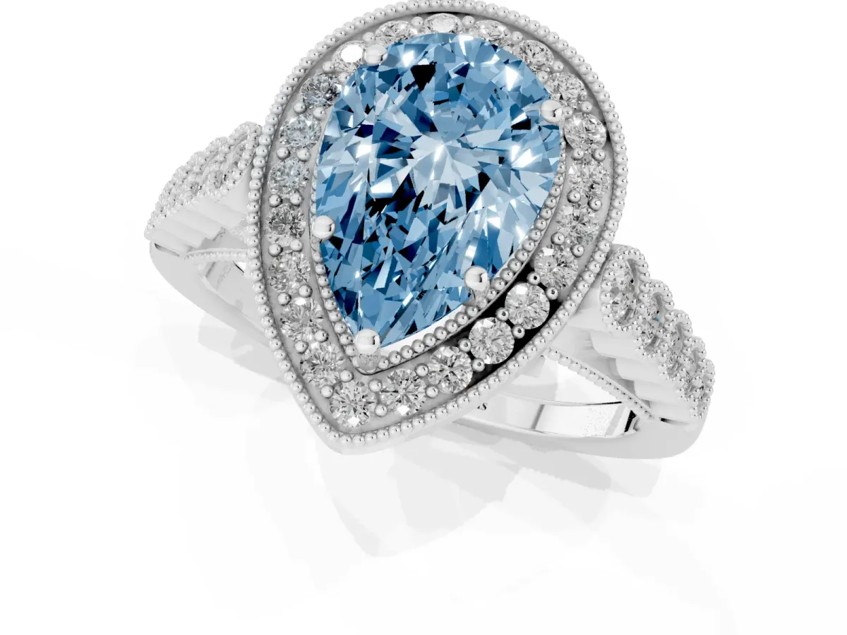 Fancy Blue Pear Cut Halo Milgrain Solitaire with Bezel Set Side Stones and Pave Band Silver