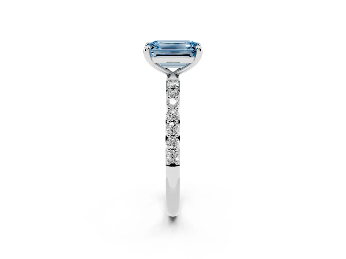 Fancy Blue Emerald Cut Diamond Solitaire Ring with Round Pavé Band and Prong Setting Silver
