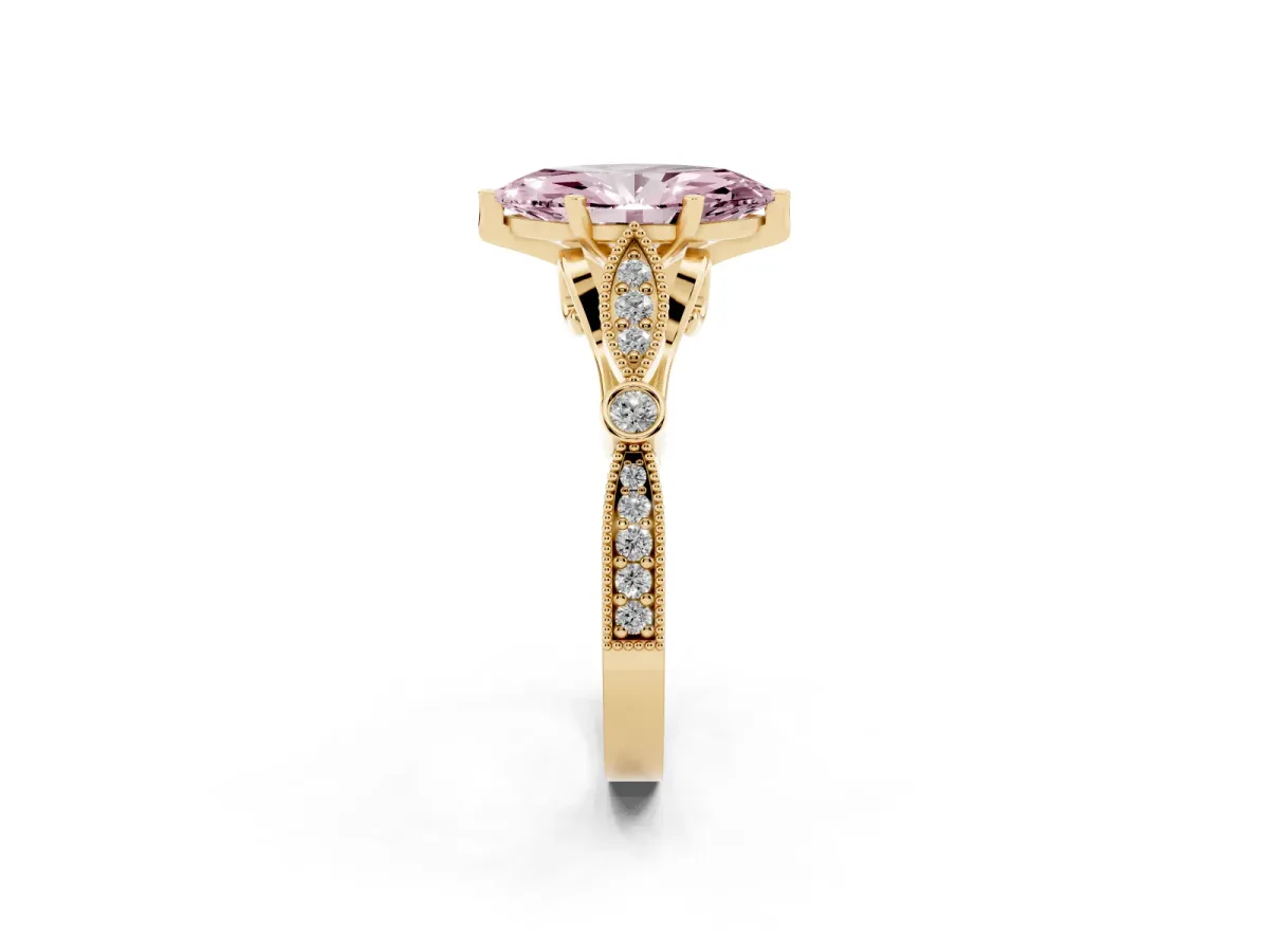 Fancy Pink Marquise Cut Cut Diamond with Milgrain Marquise and Bezel Accents on a Solitaire Band with Prong Setting Yellow gold