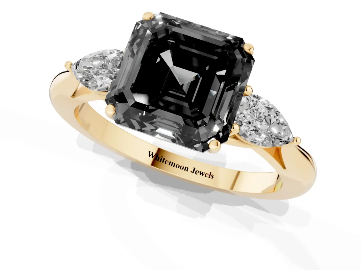 Fancy Black Asscher Cut Diamond Three-Stone Ring with Pear Side Stones and Prong Setting Yellow gold