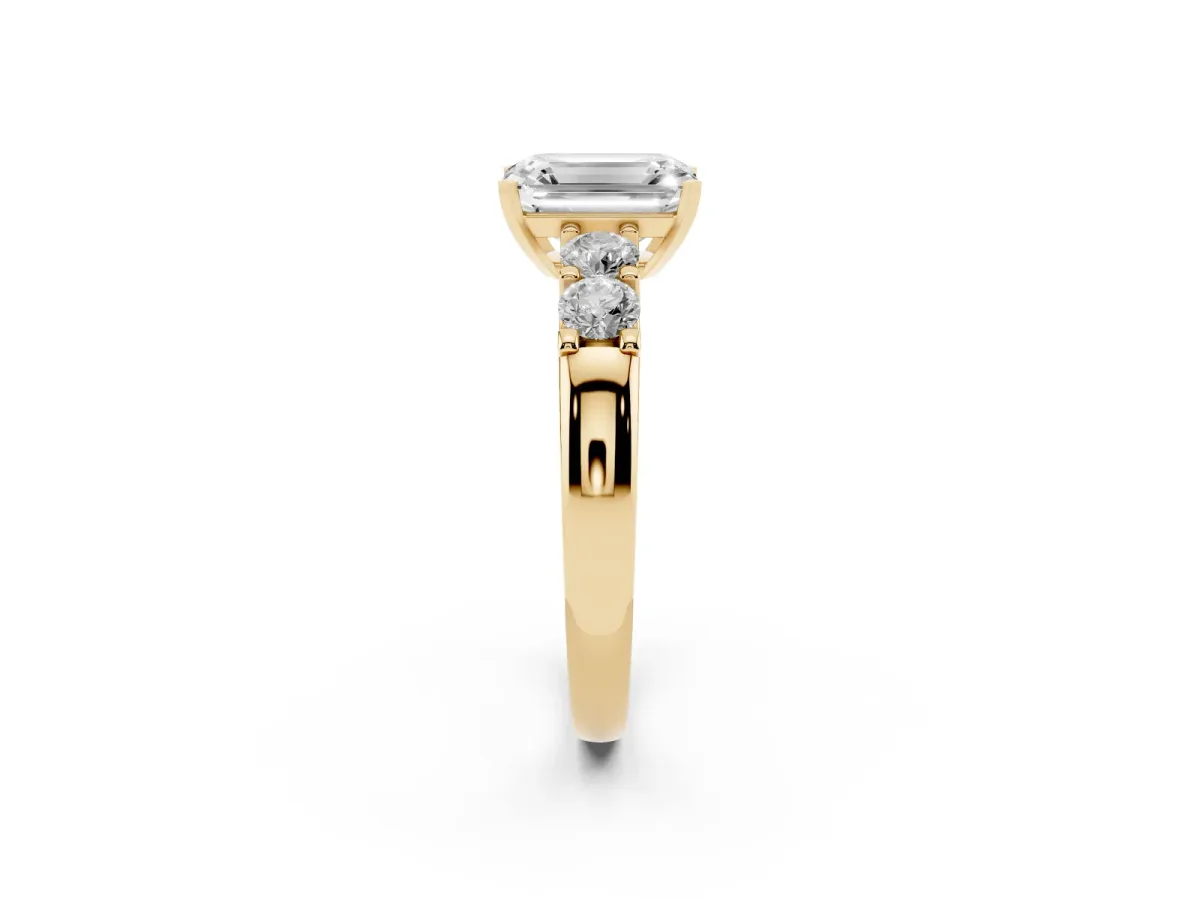 Emerald Cut Brilliant Cut Diamond Five-Stone Prong Set Engagement Ring with Channel Band Yellow gold