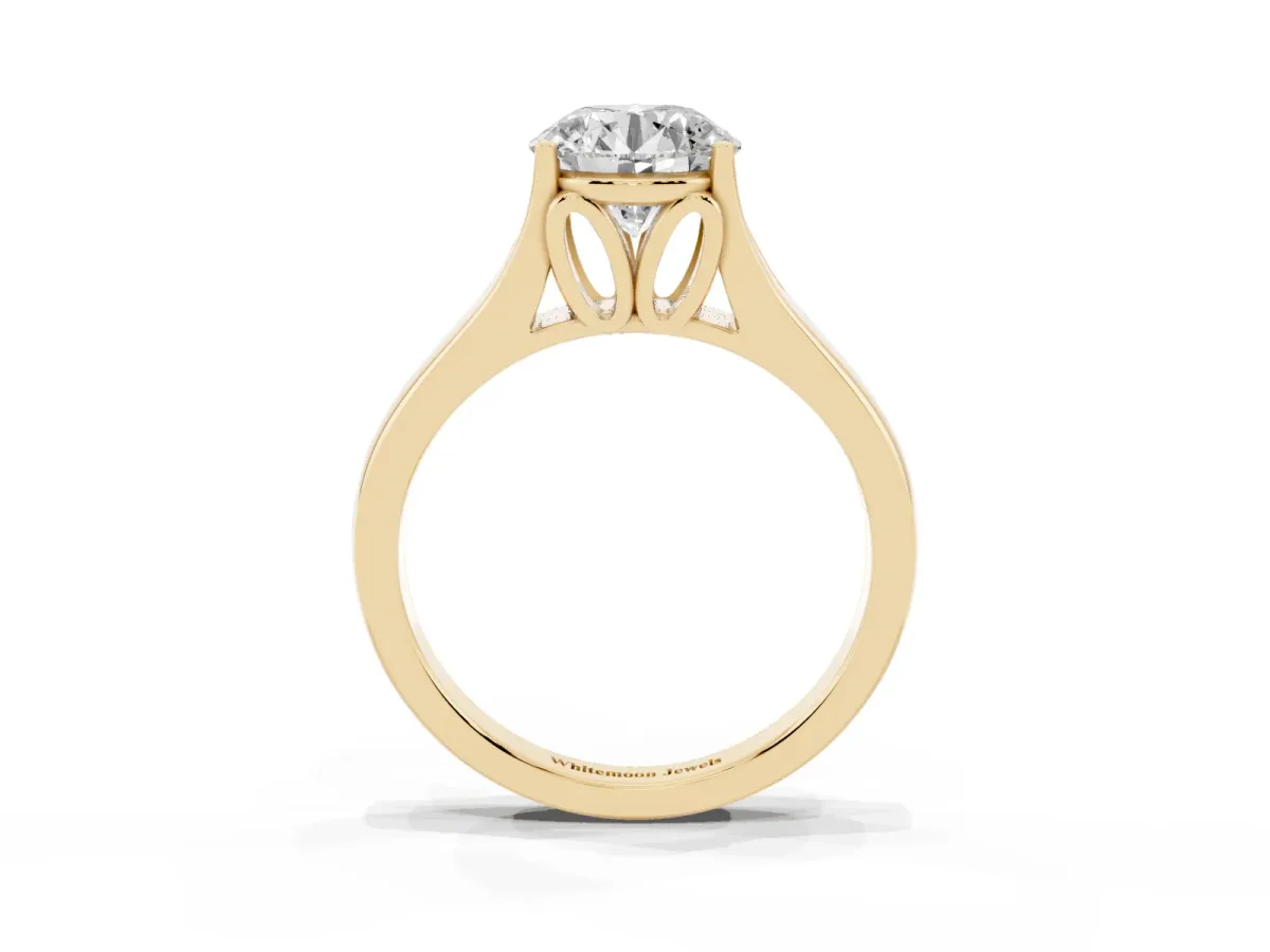 Round Cut Solitaire Diamond Ring with Cathedral Band and Four-Prong Setting Yellow gold