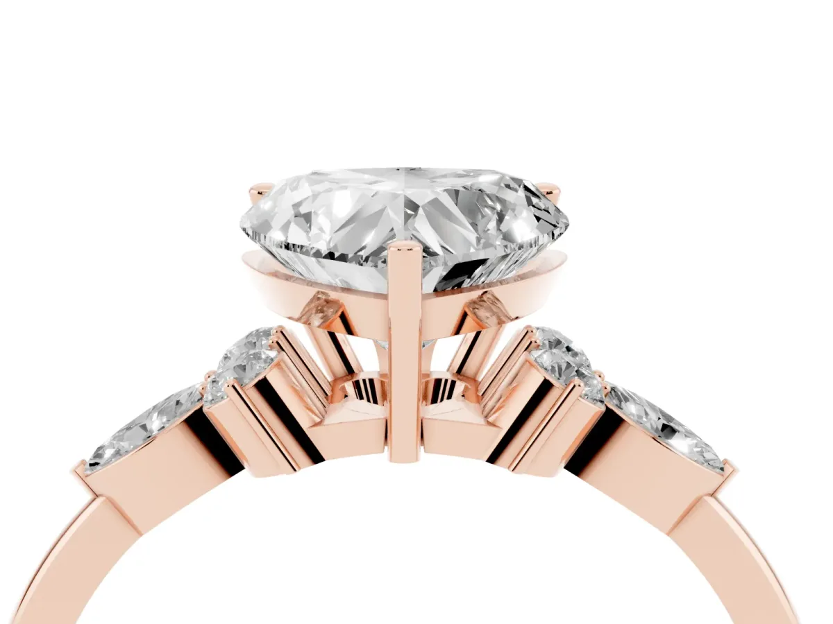 Heart Cut Brilliant Diamond Solitaire Ring with Pear Side Stones and Four-Prong Setting Rose gold