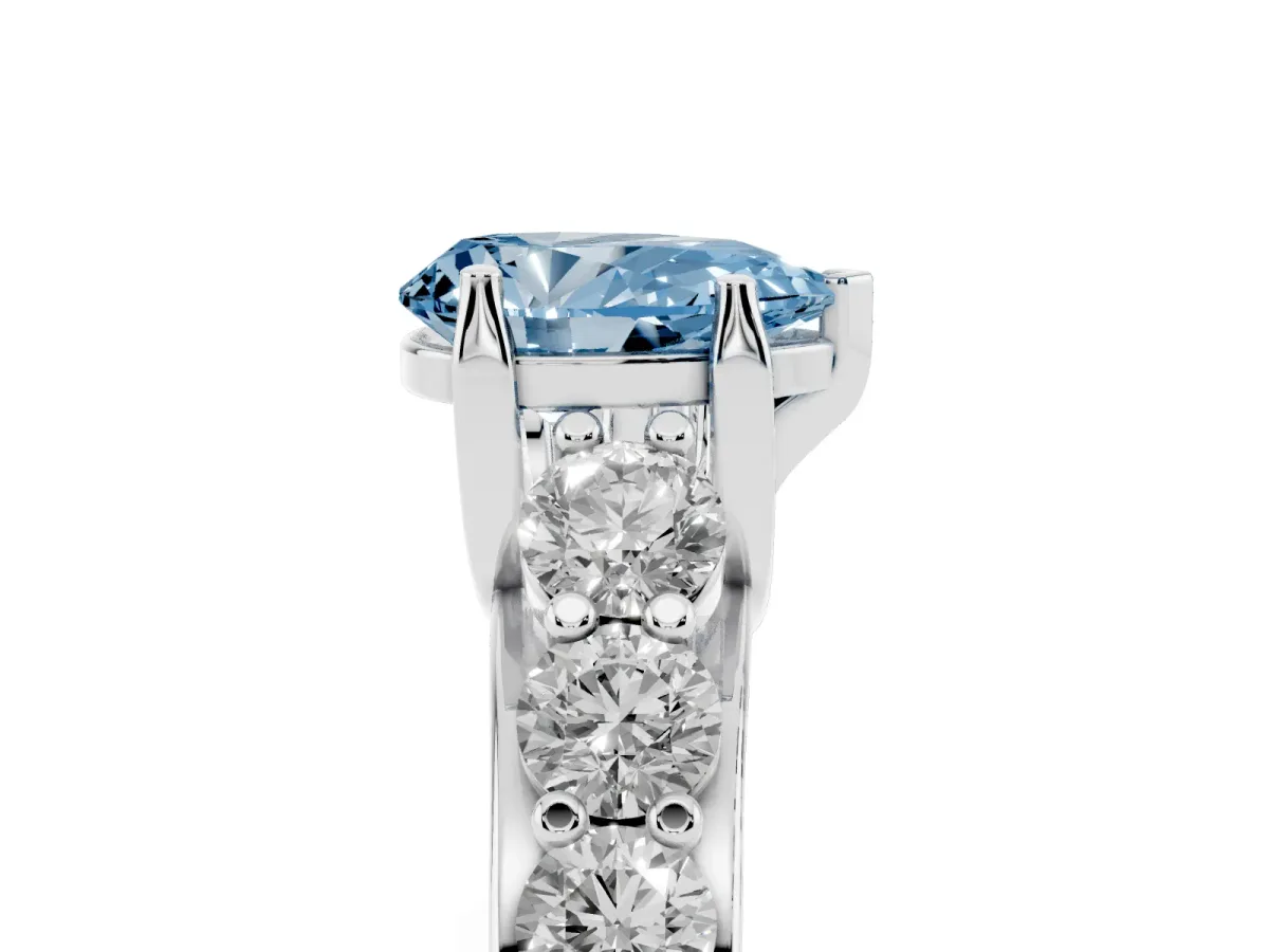 Fancy Blue Pear Cut Diamond Engagement Ring with Pavé Band and Four-Prong Setting Silver