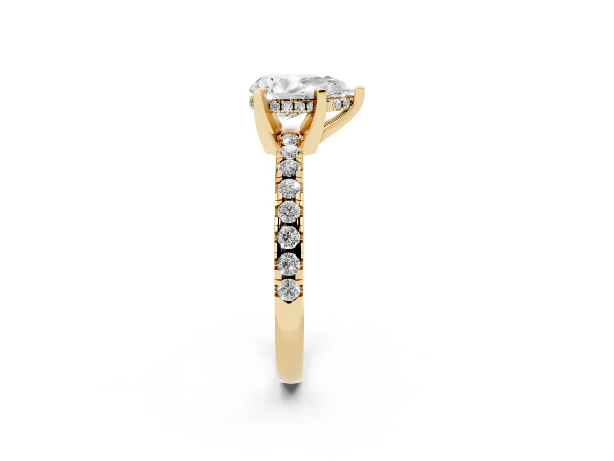 Pear Cut Diamond Solitaire Ring with Round Pavé Band and Four-Prong Setting Yellow gold