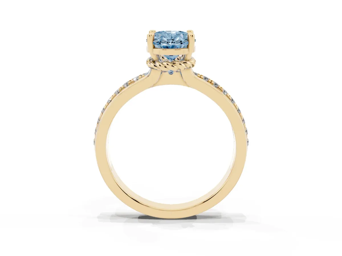 Fancy Blue Oval Cut Solitaire Diamond Ring with Channel Set Band and Six-Prong Setting Yellow gold