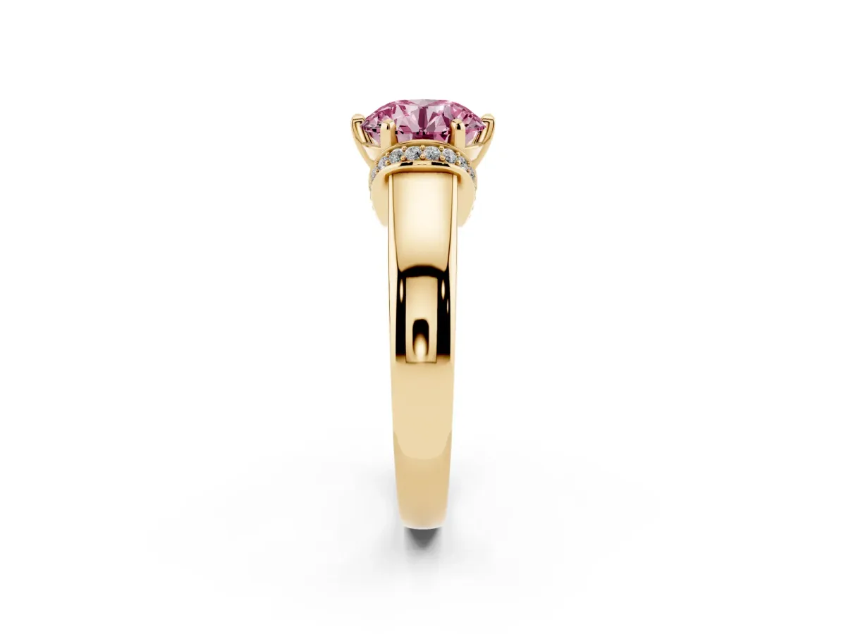 Fancy Pink Round Cut Solitaire Diamond Ring with Pave Band and Six-Prong Setting Yellow gold