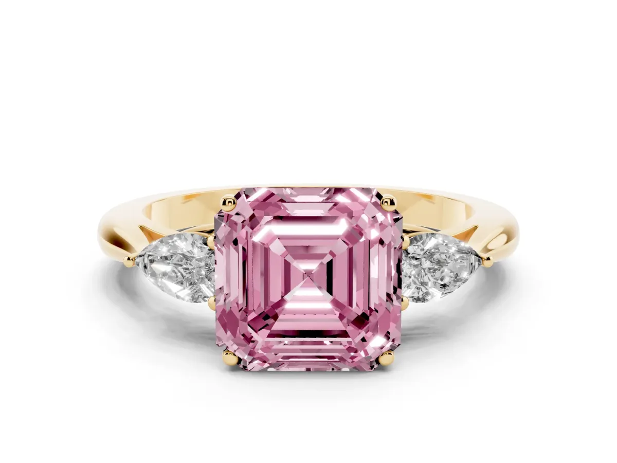 Fancy Pink Three-Stone Asscher Cut Diamond Ring with Pear Side Stones in Four-Prong Setting Yellow gold