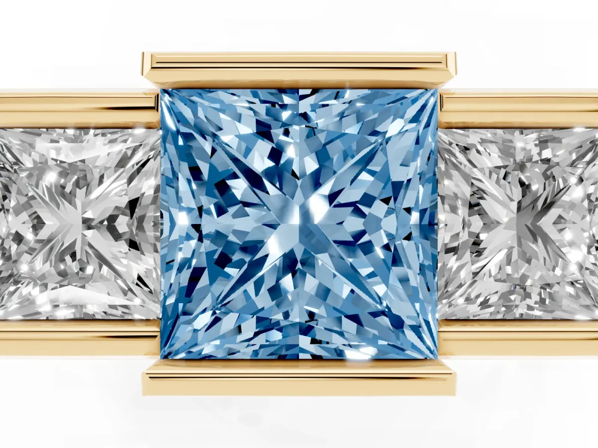 Fancy Blue Three Stone Princess Cut Cut Channel Set Diamond Ring Yellow gold