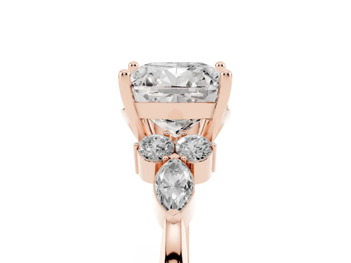 Cushion Cut Brilliant Diamond Solitaire Ring with Pear Side Stones and Four-Prong Setting Rose gold