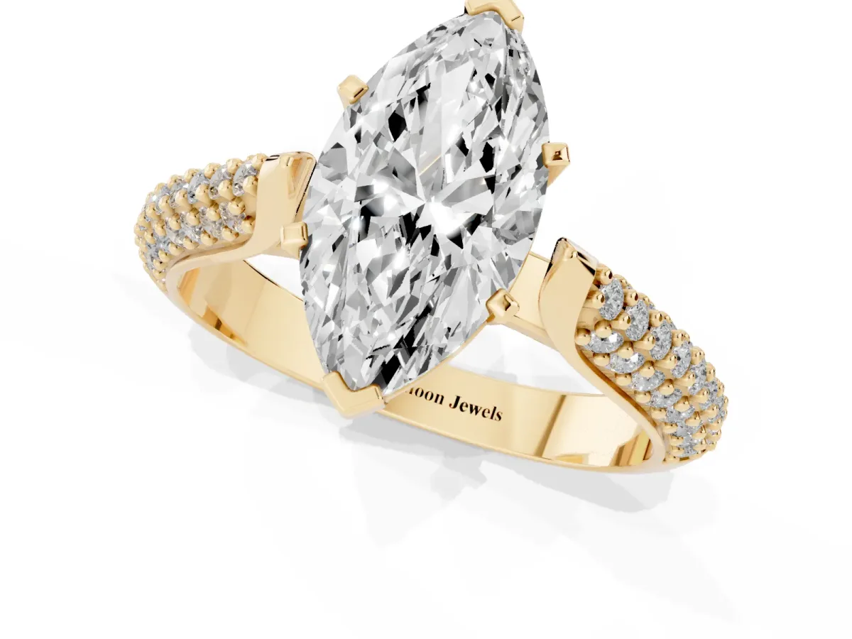 Marquise Cut Diamond Solitaire Engagement Ring with Multi-Row Round Pavé Band and Prong Setting Yellow gold