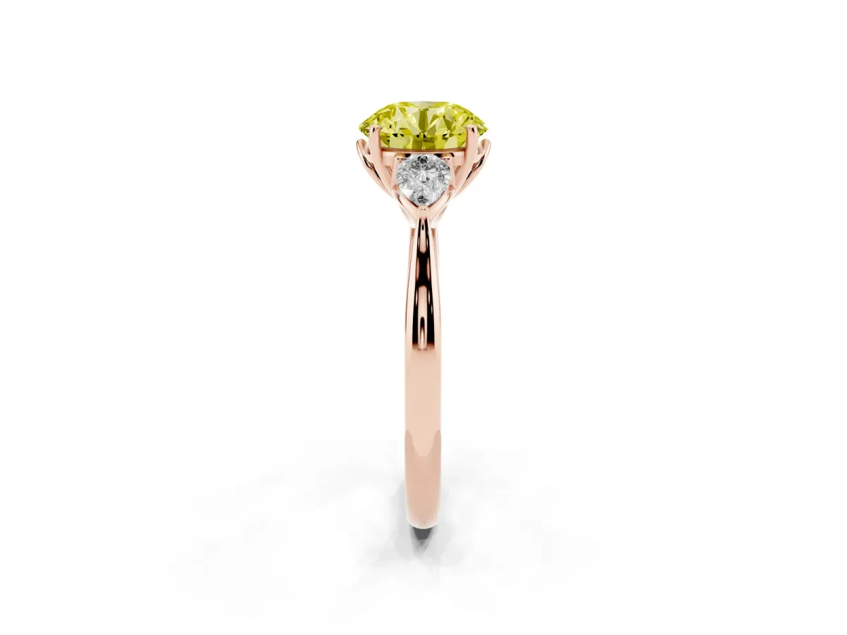 Fancy Yellow Three-Stone Round Cut Brilliant Diamond Solitaire Ring with Tapered Band and Four-Prong Setting Rose gold