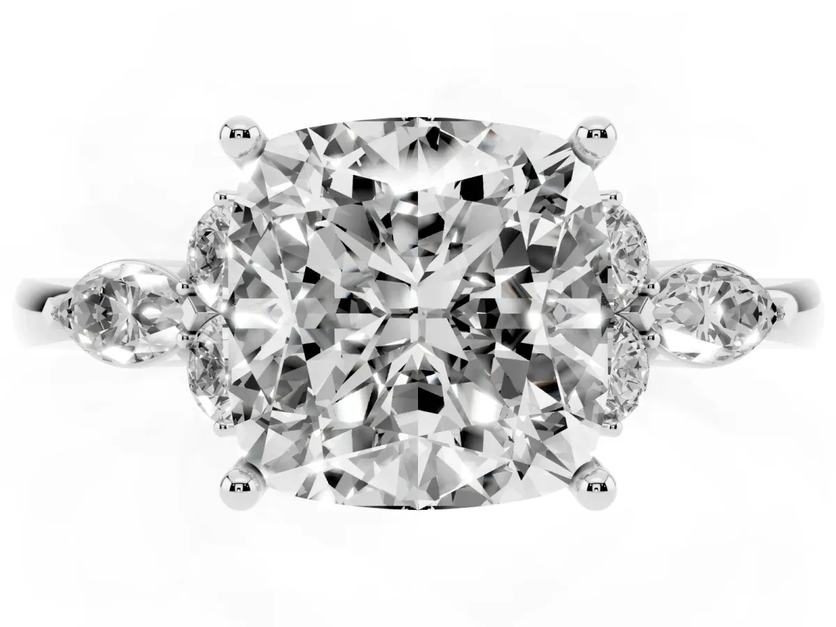 Cushion Cut Brilliant Diamond Solitaire Ring with Pear Side Stones and Four-Prong Setting Silver