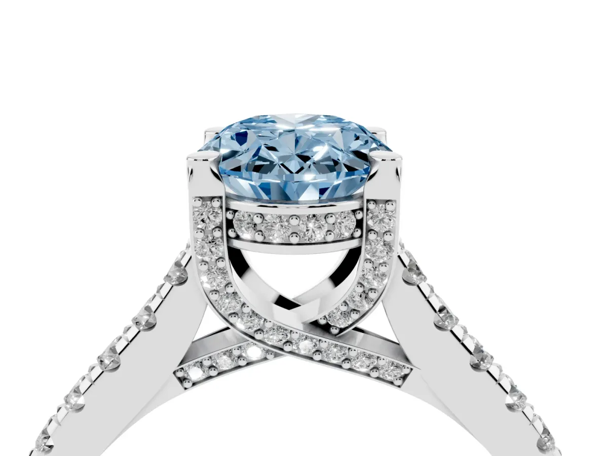 Fancy Blue Oval Cut Brilliant Diamond Solitaire with Pavé Band and Four-Prong Setting Platinum