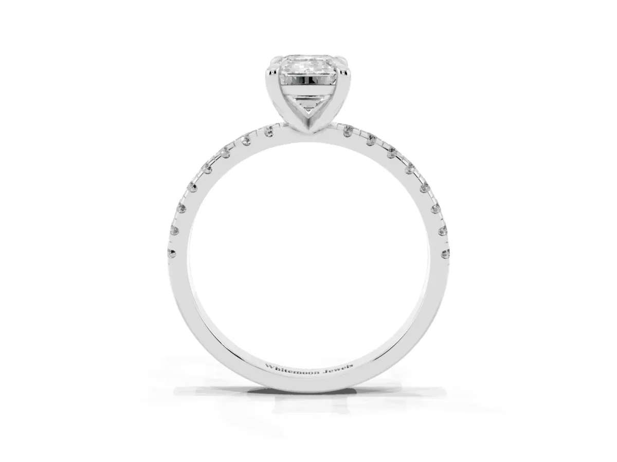 Emerald Cut Diamond Brilliant Solitaire Ring with Pavé Band and Four-Prong Setting White gold
