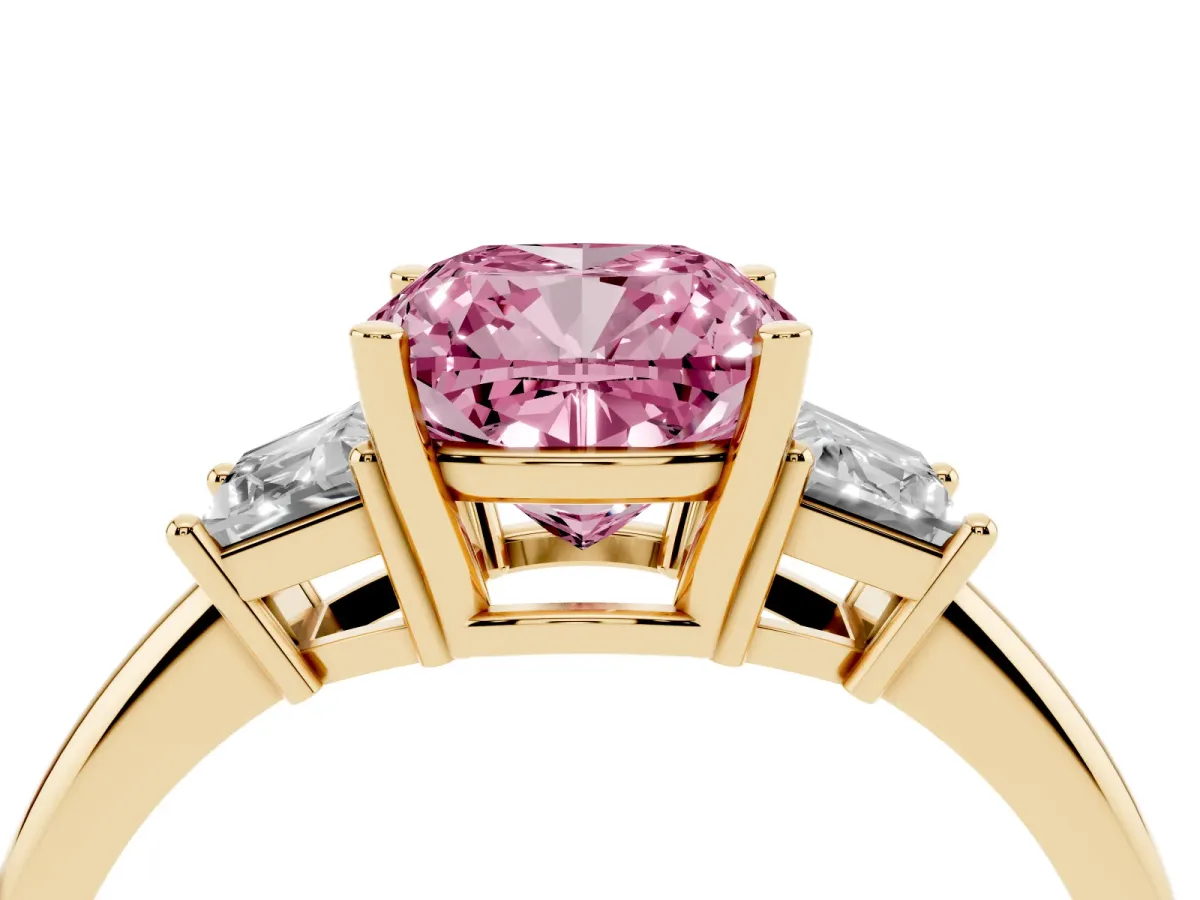 Fancy Pink Cushion Cut Diamond Three-Stone Ring with Trapezoid Side Stones and Prong Setting Yellow gold