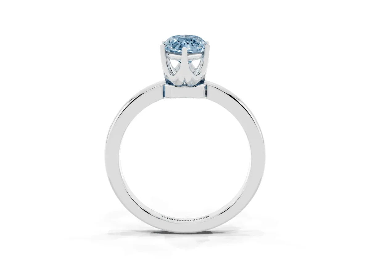 Fancy Blue Marquise Cut Solitaire Diamond Ring with Six-Prong Setting on a Classic Band Silver