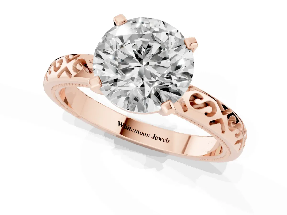 Round Cut Solitaire Engagement Ring with Scrollwork Band and Four-Prong Setting Rose gold