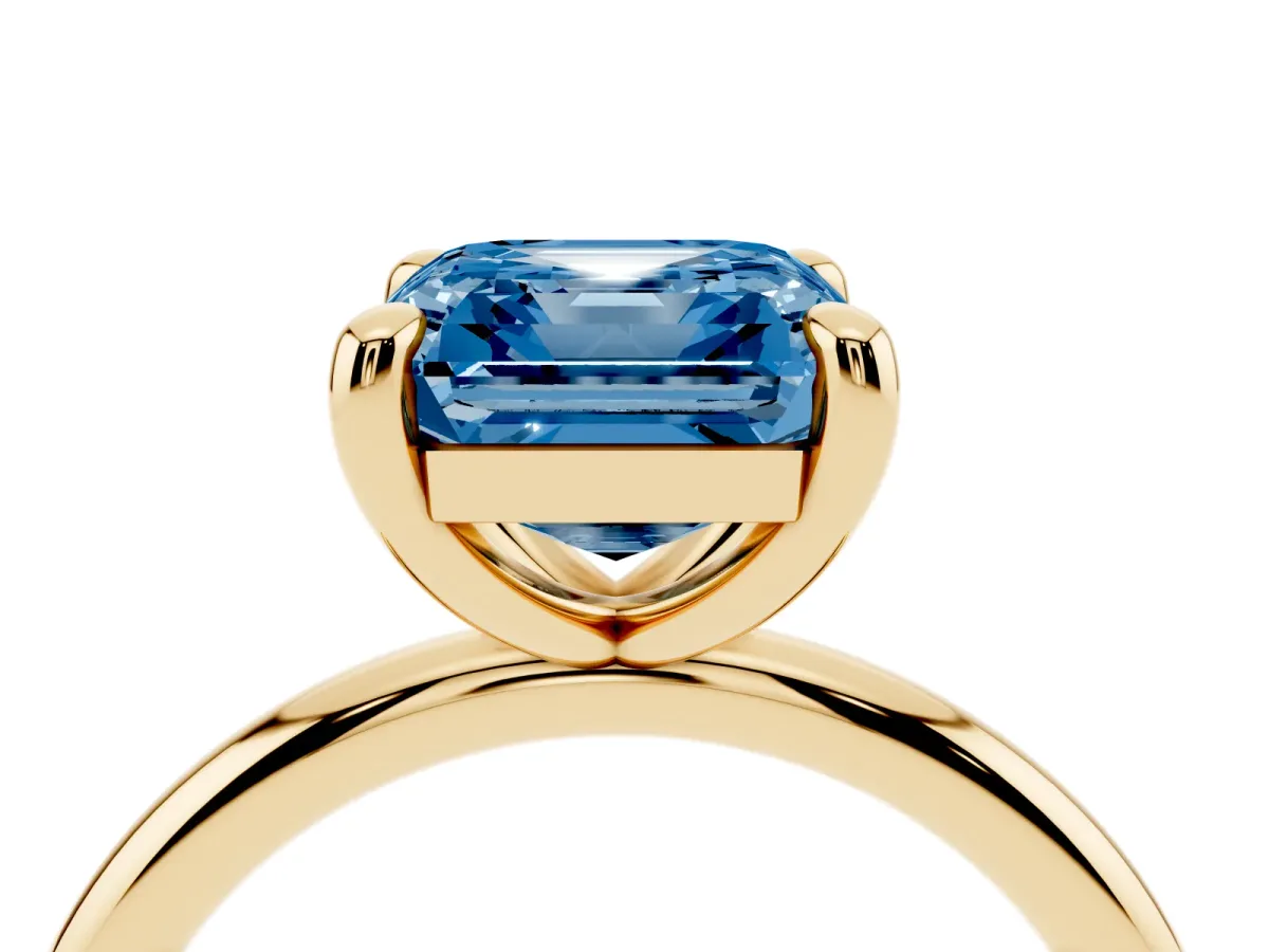 Fancy Blue Asscher Cut Solitaire Diamond Ring with Four-Prong Setting on a Plain Band Yellow gold