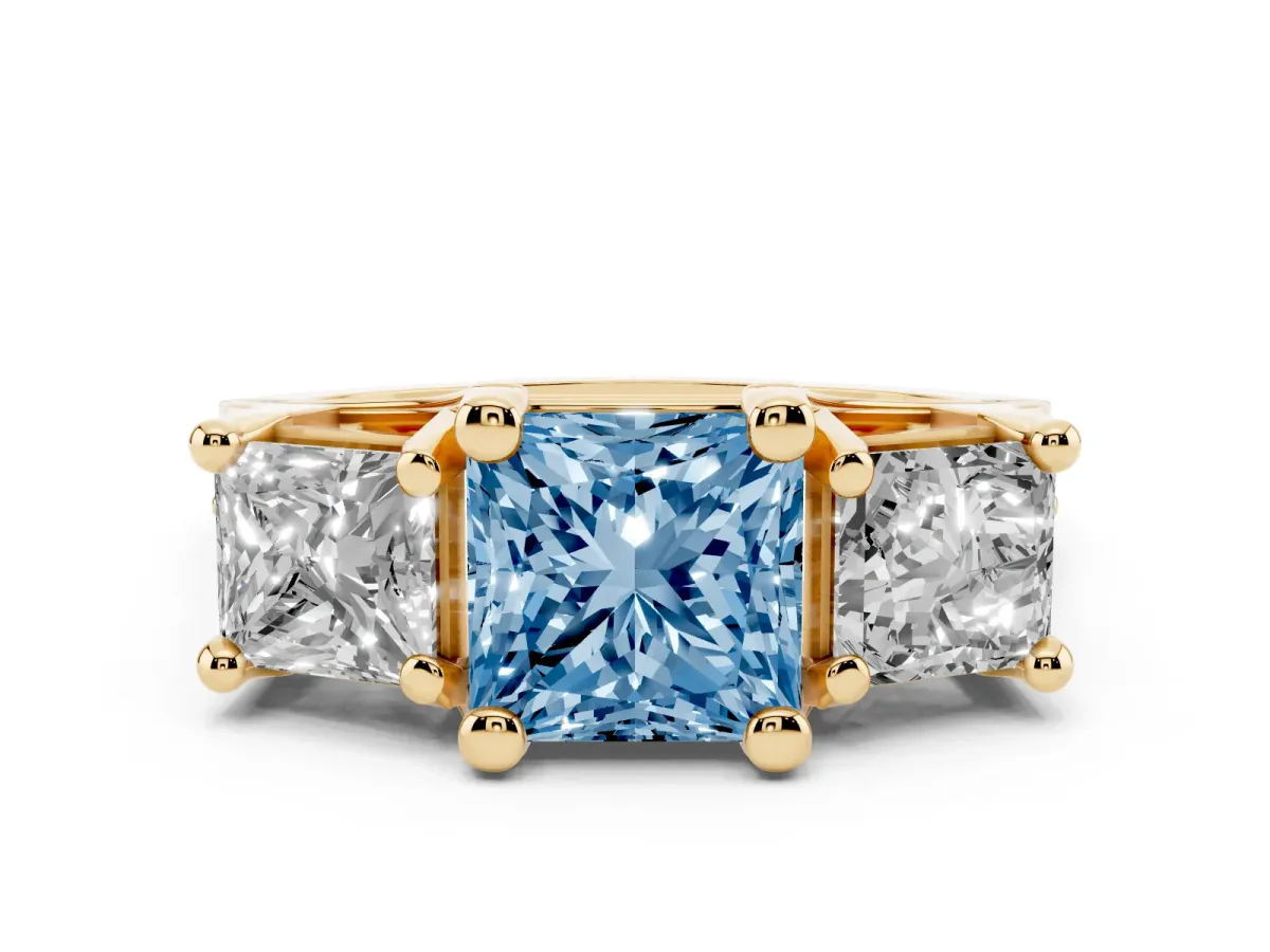 Fancy Blue Princess Cut Diamond Three-Stone Ring with Channel Set Band and Four-Prong Setting Yellow gold