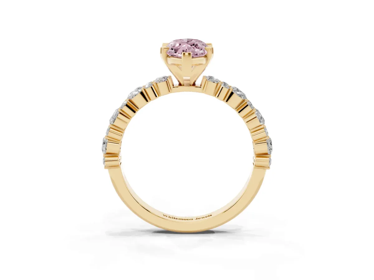 Fancy Pink Marquise Cut Diamond Side Stone Solitaire Ring with Round and Four-Prong Setting Yellow gold