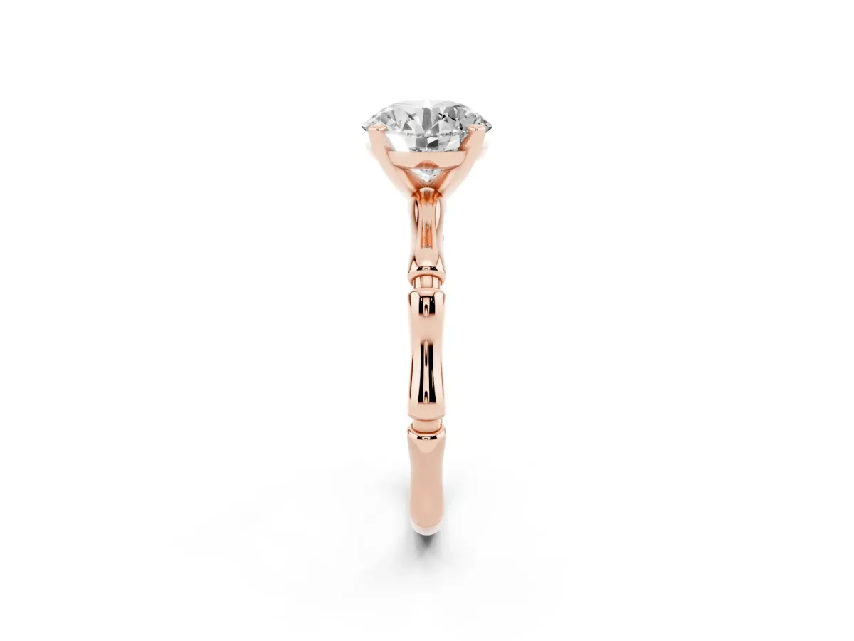 Round Cut Solitaire Diamond Ring with Bamboo Band and Four-Prong Setting Rose gold