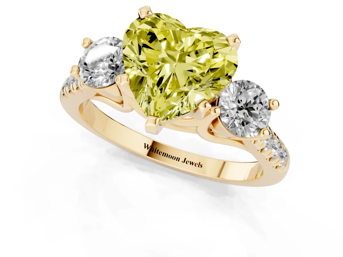 Fancy Yellow Three-Stone Heart Cut Diamond Pavé Band with Four-Prong Setting Yellow gold